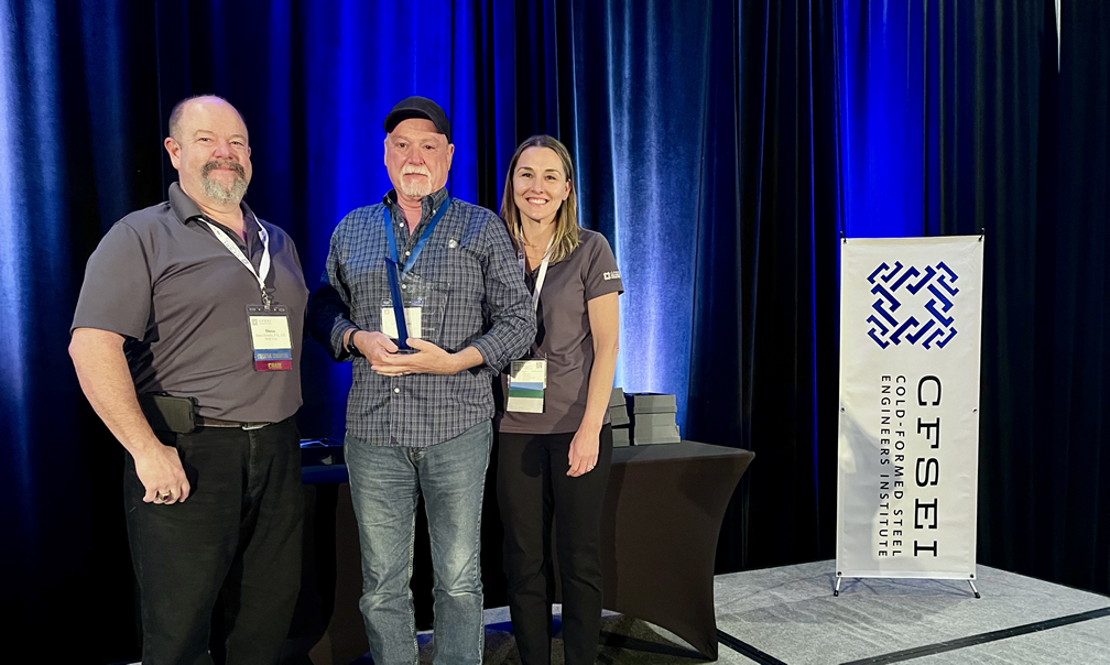 Larry Williams (center) accepts the CFSEI John P. Matsen Award for Distinguished Service Award presented by CFSEI’s Immediate Past Chair Dana Hennis and Chair Tammy Gleed.