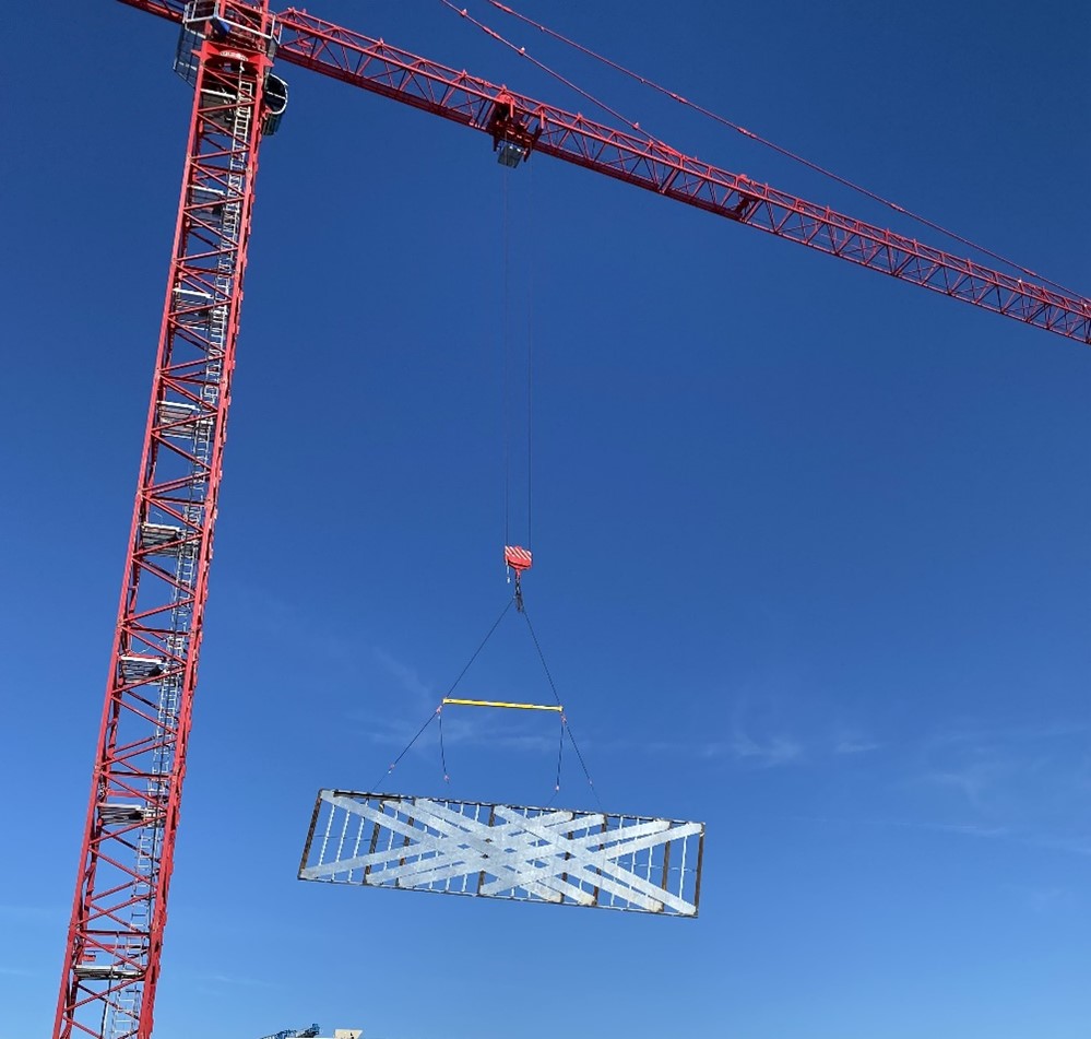 Installation of interwoven shear walls - Photo courtesy of Eisen Group Installation of interwoven shear walls - Photo courtesy of Eisen Group