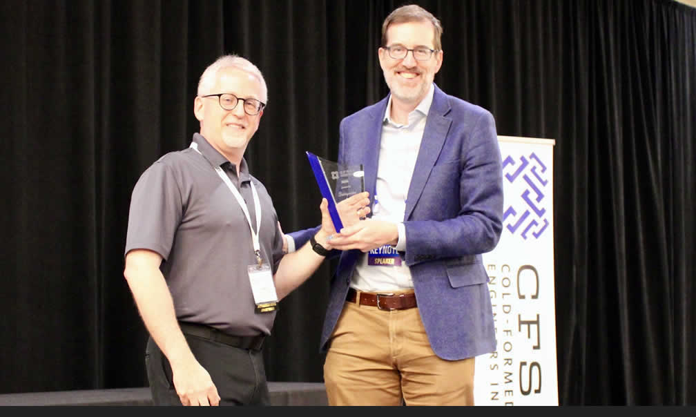 Benjamin W. Schafer, Ph.D., P.E., F.SEI (right) accepts the CFSEI John P. Matsen Award for Distinguished Service Award presented by Jeffrey Klaiman, P.E., CFSEI Managing Director