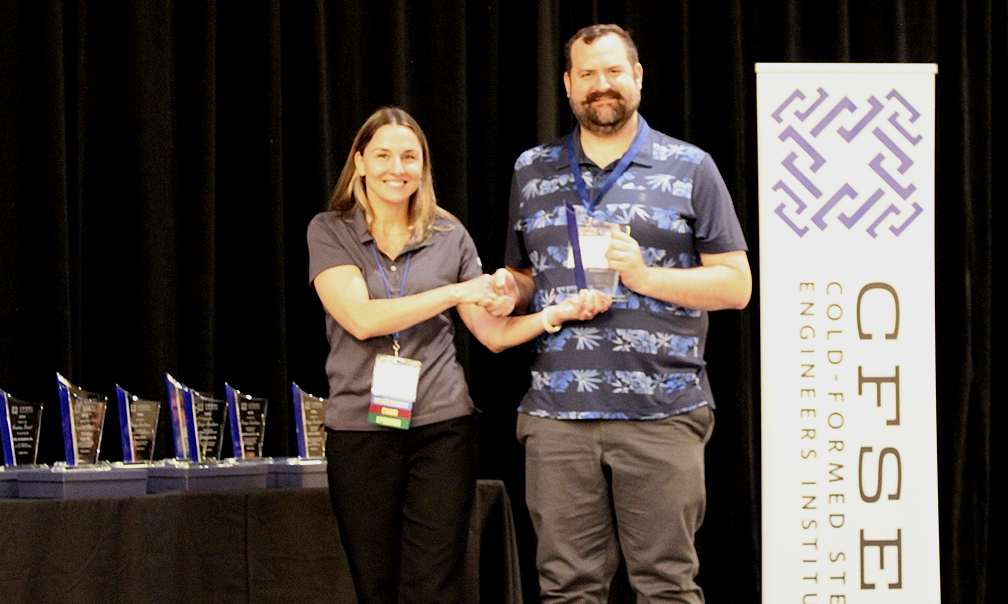 Derek Putz, P.E., American Way Engineering Accepts the CFSEI Design Excellence First Place Award, Commercial Category Presented by Tammy Gleed, P.E., CFSEI Immediate Past Chair Derek Putz, P.E., American Way Engineering Accepts the CFSEI Design Excellence First Place Award, Commercial Category Presented by Tammy Gleed, P.E., CFSEI Immediate Past Chair