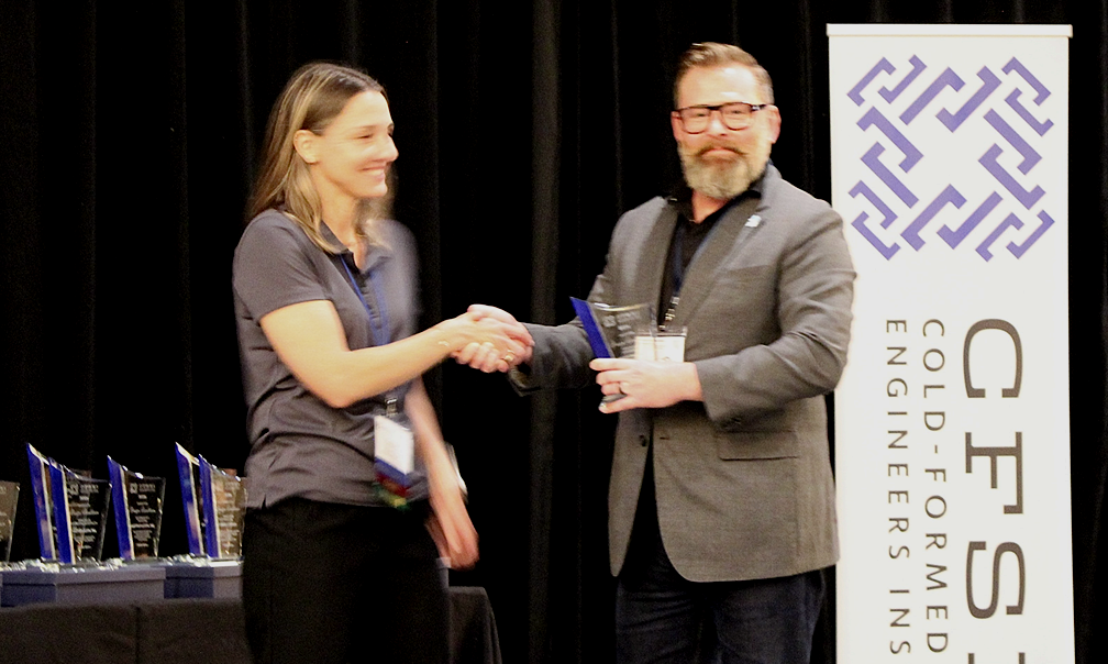 Matthew Comber, Industrialized Construction Solutions, Inc. Accepts the CFSEI Design Excellence Third Place Award, Commercial Category Presented by Tammy Gleed, P.E., CFSEI Immediate Past Chair Matthew Comber, Industrialized Construction Solutions, Inc. Accepts the CFSEI Design Excellence Third Place Award, Commercial Category Presented by Tammy Gleed, P.E., CFSEI Immediate Past Chair
