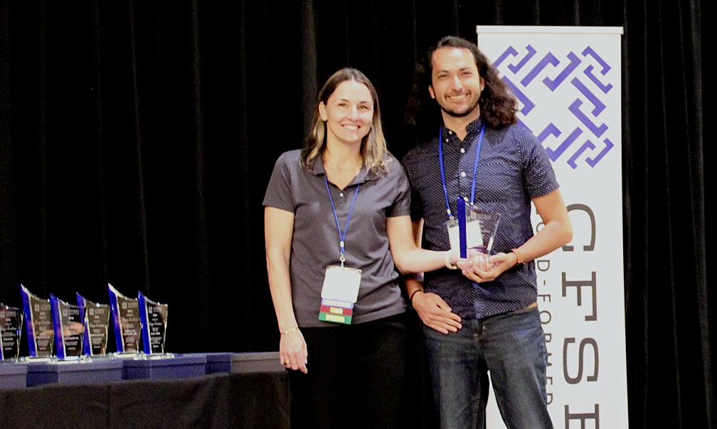 Michael Castleman, McClure Accepts the CFSEI Design Excellence Second Place Award, Commercial Category Presented by Tammy Gleed, P.E., CFSEI Immediate Past Chair Michael Castleman, McClure Accepts the CFSEI Design Excellence Second Place Award, Commercial Category Presented by Tammy Gleed, P.E., CFSEI Immediate Past Chair