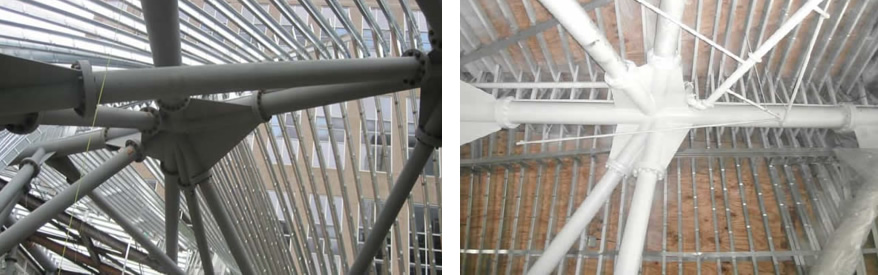 Left: Interior Picture of Curved Stud Profile 
and Roof Looking Up.  | Right: Interior Picture of Box Beams Spanning Between Circular Tube for Support. | Photos courtesy of ADTEK Engineers, Inc. 