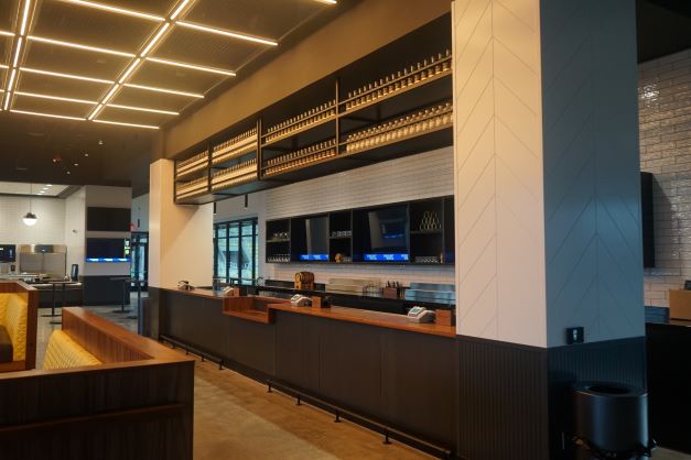 Hanging Liquor Display from CFMF Above Ceiling - Photo courtesy of Valley Interior Systems, Inc. Hanging Liquor Display from CFMF Above Ceiling - Photo courtesy ofValley Interior Systems, Inc.